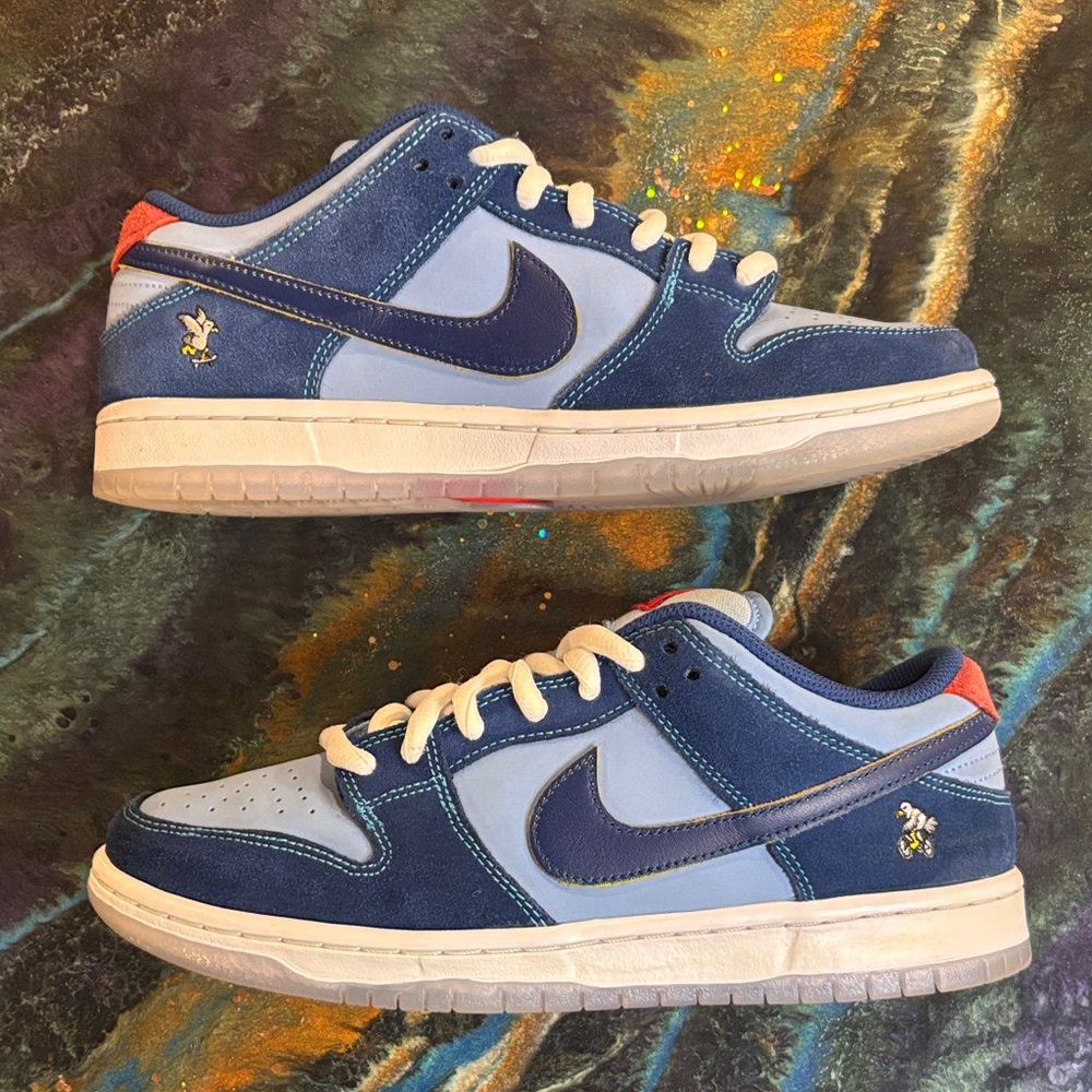 Nike Low-Top Sneakers in Light Blue & Navy with Red Heel Tab